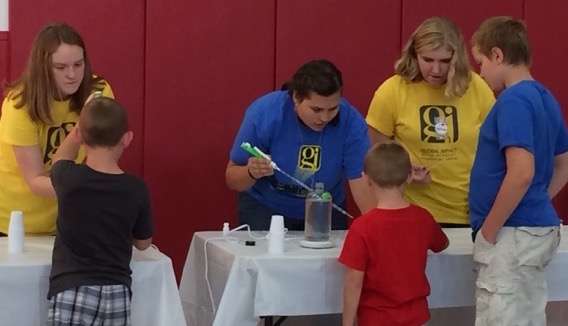 Global Impact students share science with elementary school